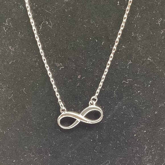Sterling Silver Infinity Pendant Necklace With Heart Charm Extension - Picture 8 of 10